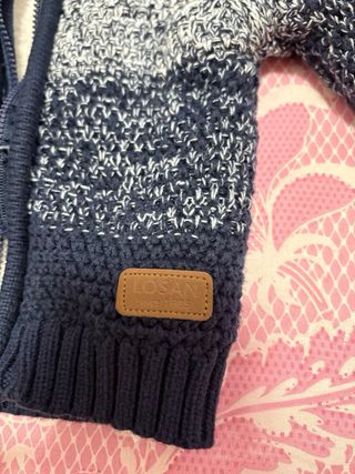 Pellicciotto neonato blu e bianco