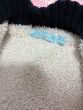 Pellicciotto neonato blu e bianco