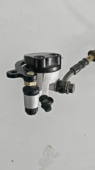 Maneta y mordaza freno hidráulico izquierdo moto