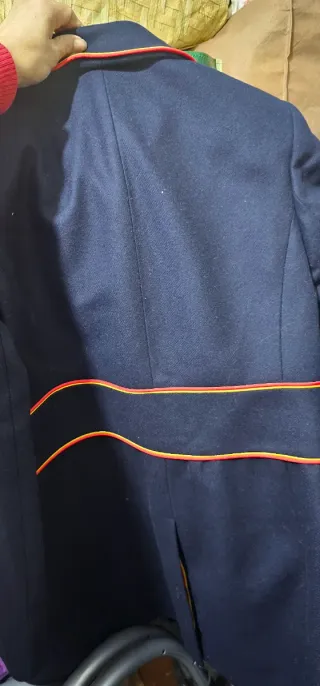 Abrigo de paño azul y dorado Iberia