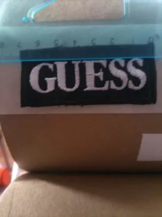 Toppa Guess nera e bianca