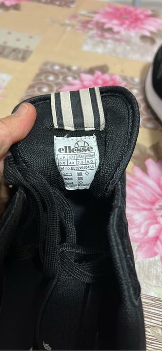 Scarpe da ginnastica Ellesse nere e oro