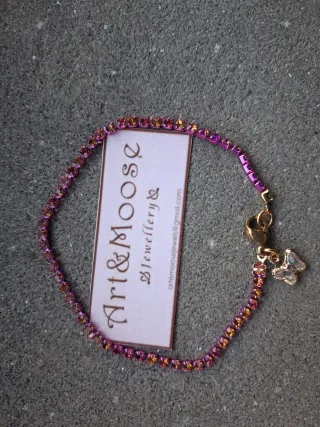 Braccialetto tennis cristalli fucsia e oro