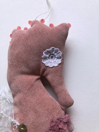 Caballito de mar rosa palo hecho a mano