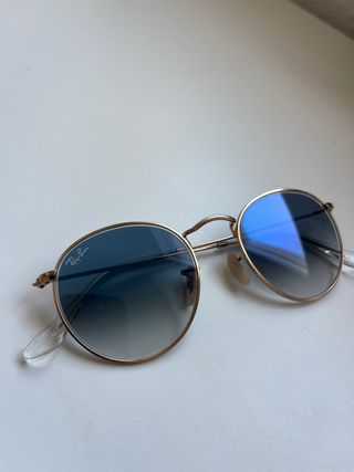 Gafas de sol Ray-Ban redondas doradas