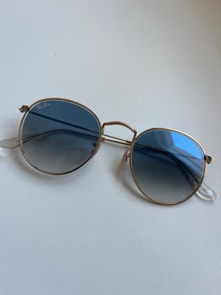 Gafas de sol Ray-Ban redondas doradas
