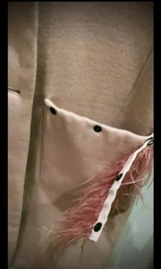 Abrigo Kosmika sin mangas