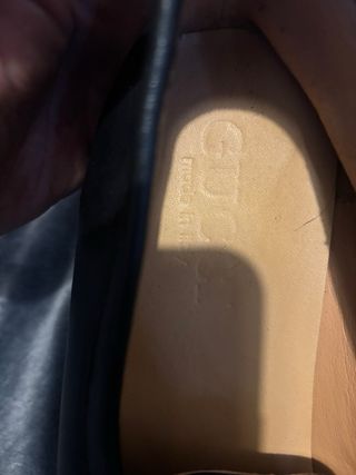 Mocasines Gucci Negro con Doble G Dorado