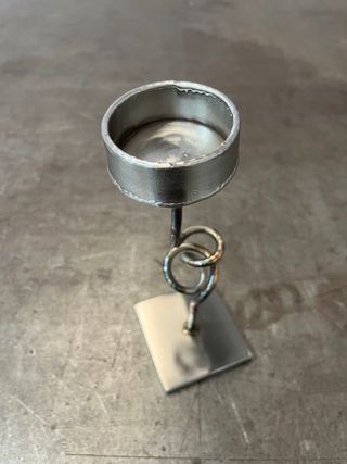 Portacandele in metallo con design a spirale