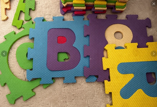 Alfombra puzzle números y letras