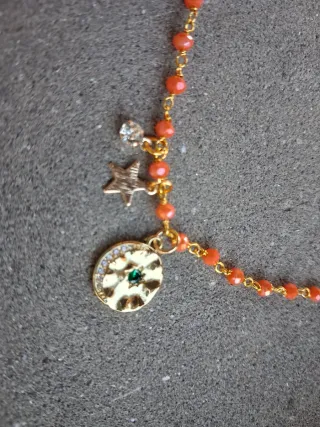 Girocollo cristalli arancioni, charm dorato