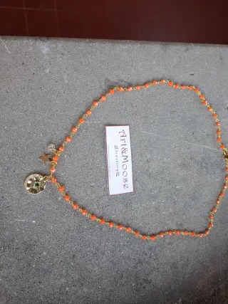 Girocollo cristalli arancioni, charm dorato
