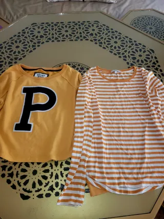 Ropa de mujer: camiseta amarilla y naranja