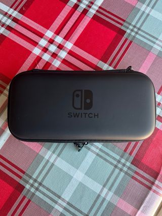 Nintendo Switch Lite + extras