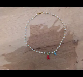 Collana cristalli turchesi, pesciolino e corallo