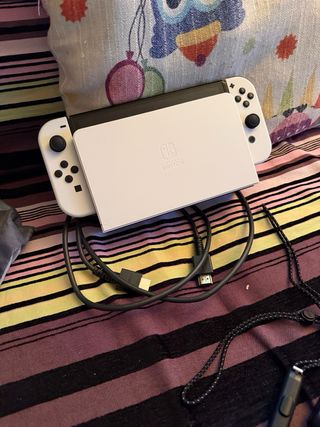 Nintendo Switch OLED + Mario Bros Wonder