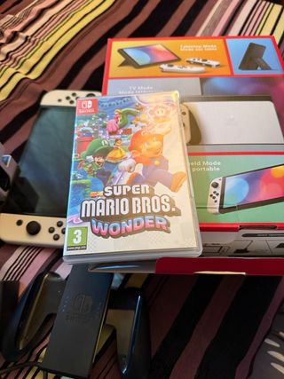 Nintendo Switch OLED + Mario Bros Wonder