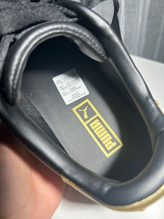 Deportivas Puma Negras y Doradas