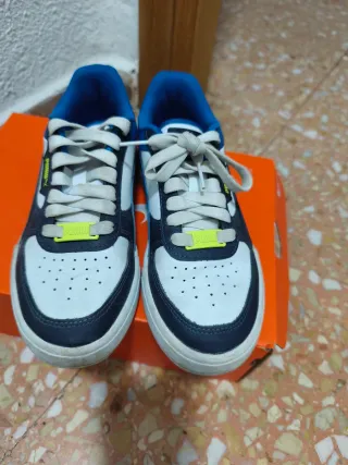 Zapatillas Puma niño azul y blanco