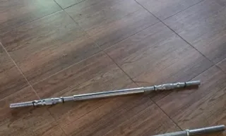 Barra de pesas ajustable