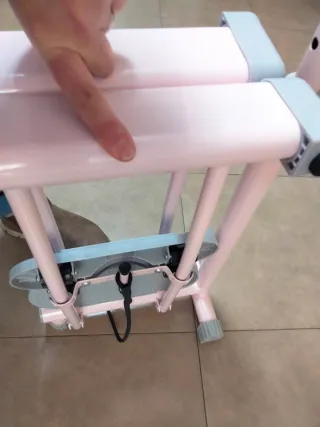 Máquina para tonificar y ejercitar piernas rosa