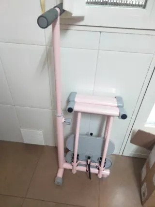 Máquina para tonificar y ejercitar piernas rosa