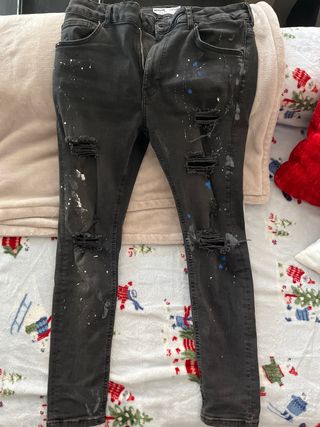 Vaqueros negros rotos talla 42