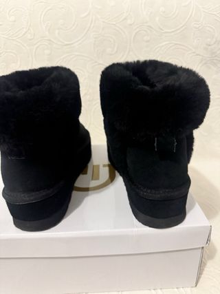Botas de pelo negras talla 38
