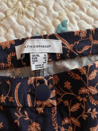 Pantalones negros estampados florales