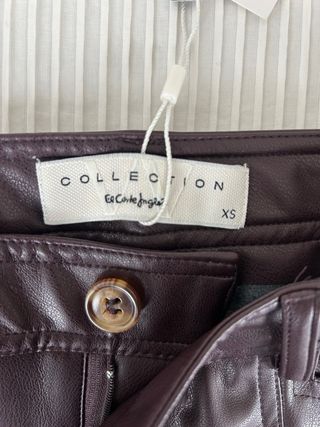 Pantalón efecto piel granate Woman nuevo