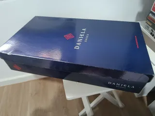 Botas altas negras tacón lazo rosa