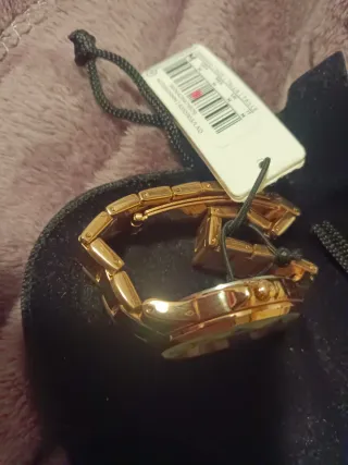 Reloj Parfois Dorado un buen  chapado .sin estrena