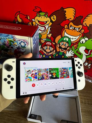 Nintendo Switch OLED 2024 COMO NUEVA + animal cros