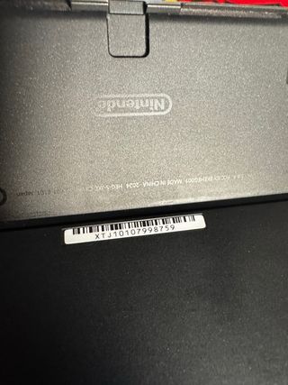 Nintendo Switch OLED 2024 COMO NUEVA + animal cros