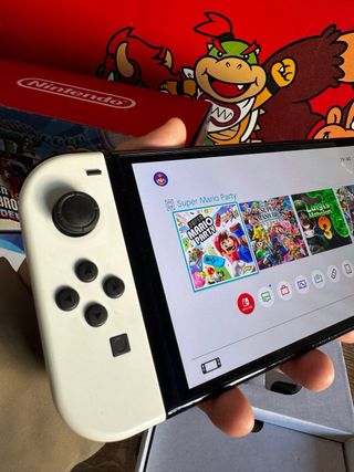 Nintendo Switch OLED 2024 COMO NUEVA + animal cros