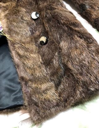 Abrigo pelo natural marrón talla S