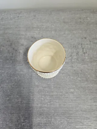 Portacandele in porcellana con bordo dorato