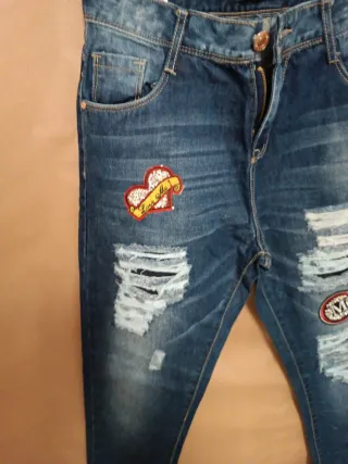 Jeans donna strappati con patch