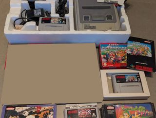 Super Nintendo SNES lote con juegos y cajas
