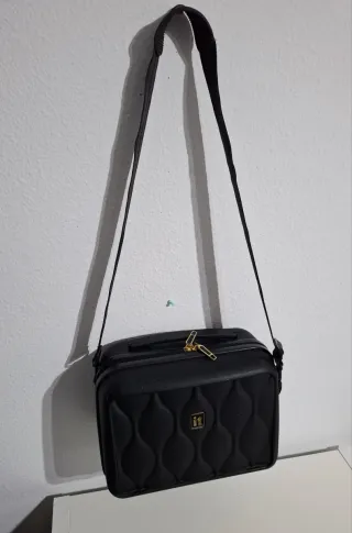 Maletín de viaje negro acolchado