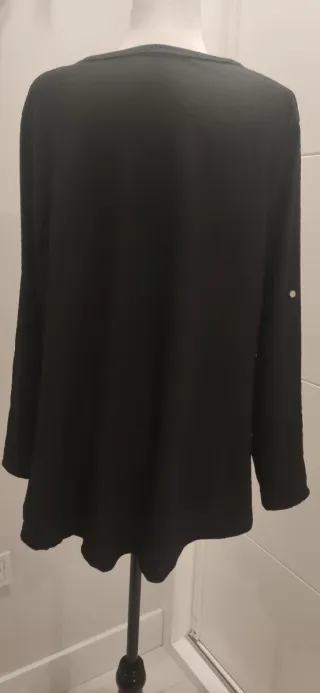 Blusón negro manga larga