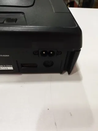 Sega Saturn Negra con cables y mando