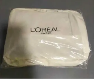 Bolso de viaje L'Oréal rojo y blanco