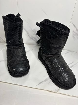 Stivali UGG neri con paillettes e fiocco