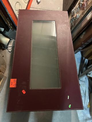 Mesa de centro polipiel con tapa de cristal