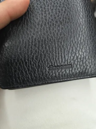 Cartera de piel negra para hombre