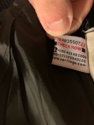 Giacca Moncler lucida con cappuccio in pelliccia