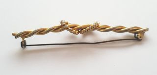 Antica Spilla dorata con Nodo intrecciato anni ’50