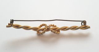 Antica Spilla dorata con Nodo intrecciato anni ’50