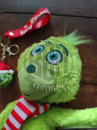 Portachiavi Grinch con sciarpa e ciondolo